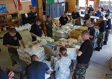 JTF-Bravo troops hike in food to local village