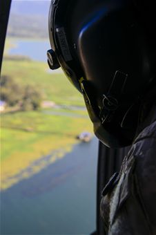 U.S. Army Spec. Ops. aids 1-228th Avn. Reg. with over water hoist training